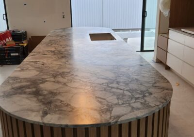 Immaculate marble kitchen benchtop by Grand Stone Restoration, adding elegance and sophistication to your culinary space.